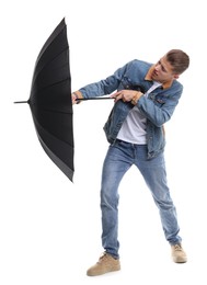 Photo of Man with black umbrella on white background