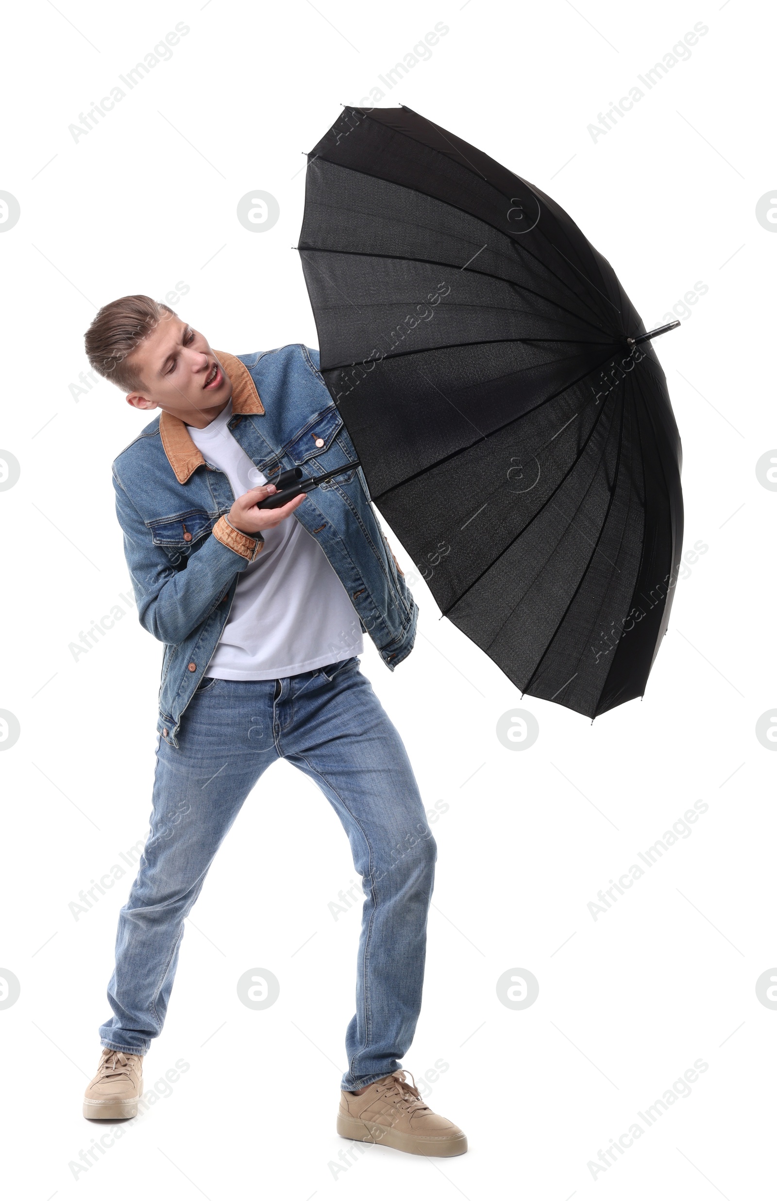 Photo of Man with black umbrella on white background