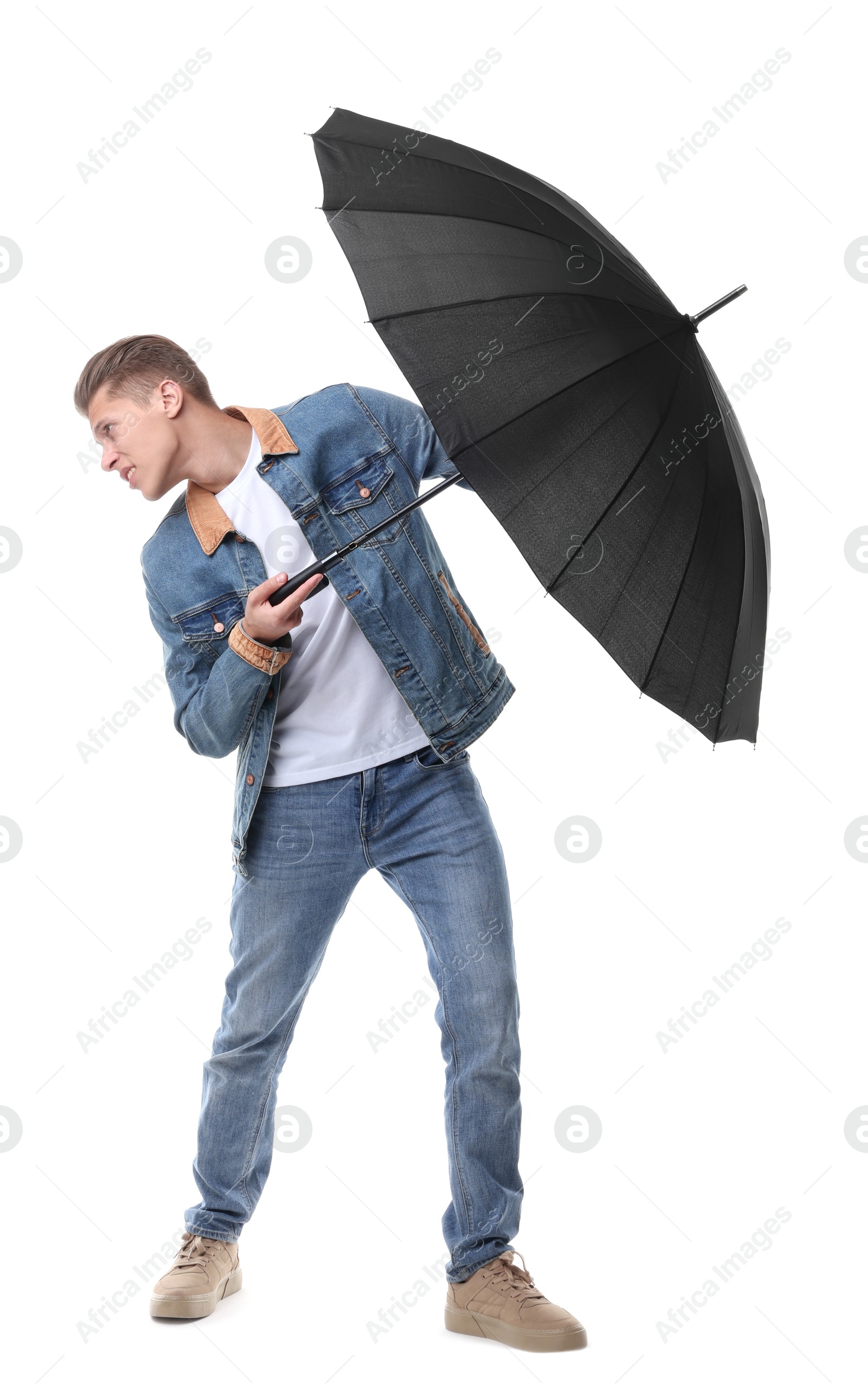 Photo of Man with black umbrella on white background