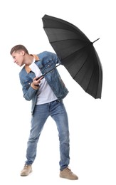 Photo of Man with black umbrella on white background