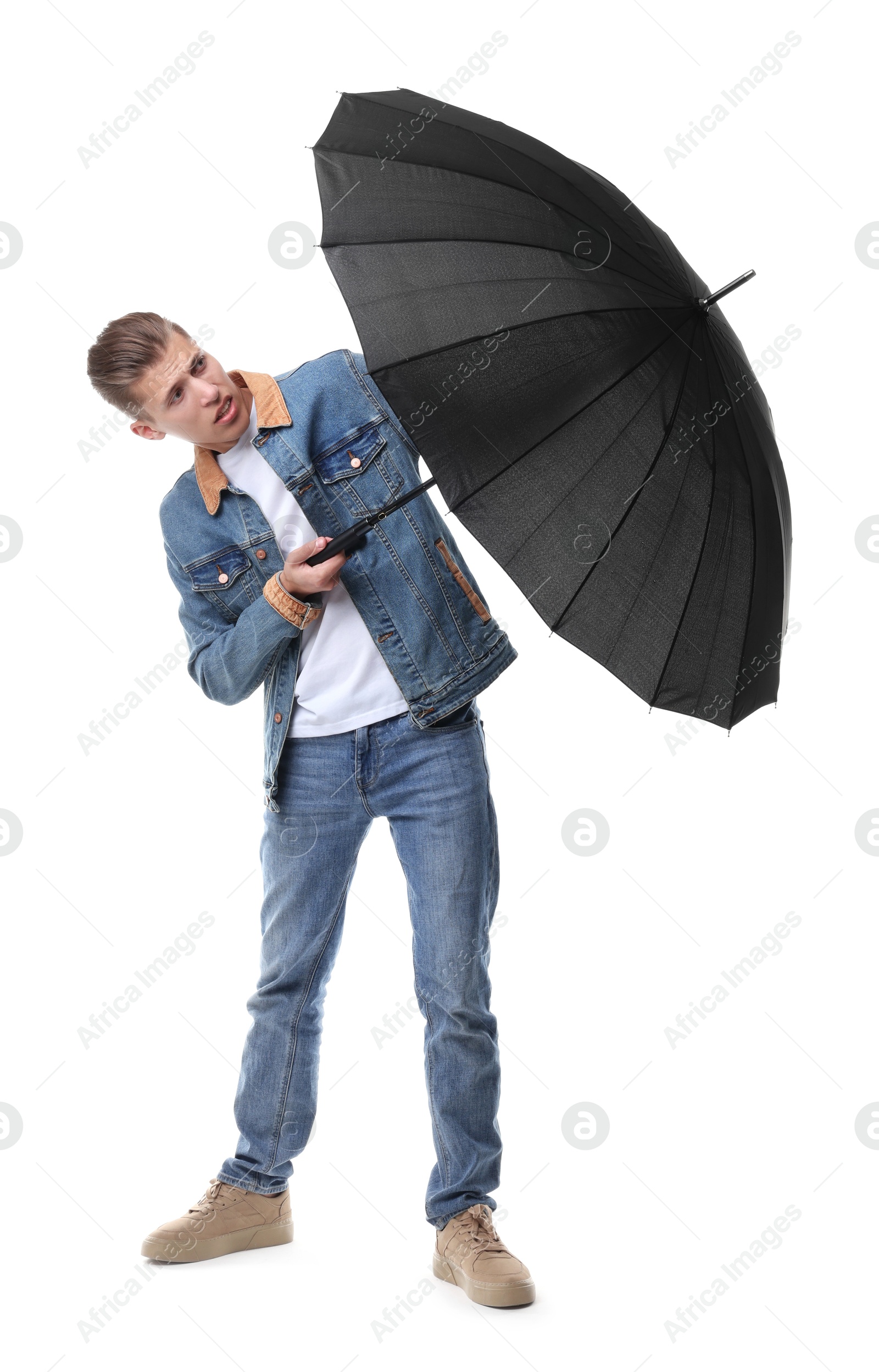 Photo of Man with black umbrella on white background