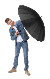 Photo of Man with black umbrella on white background