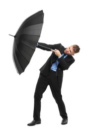 Photo of Man in suit with black umbrella on white background