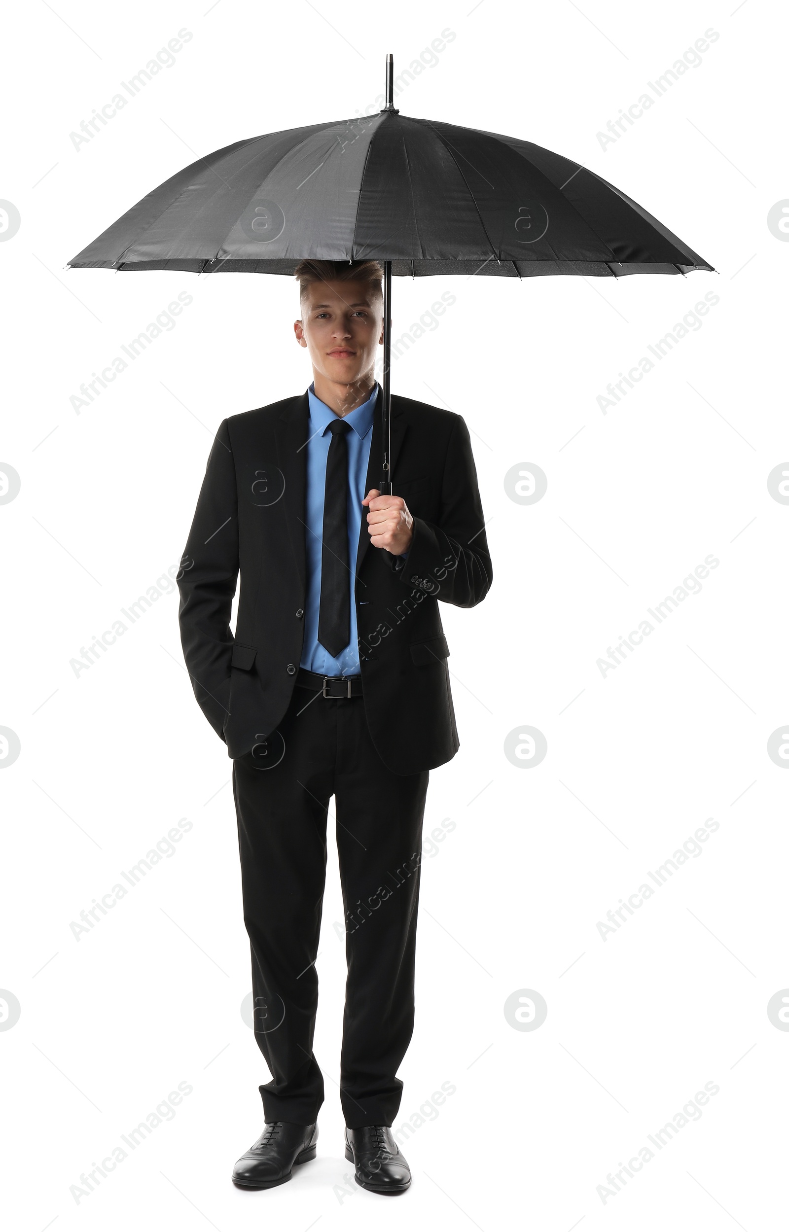 Photo of Man in suit with black umbrella on white background