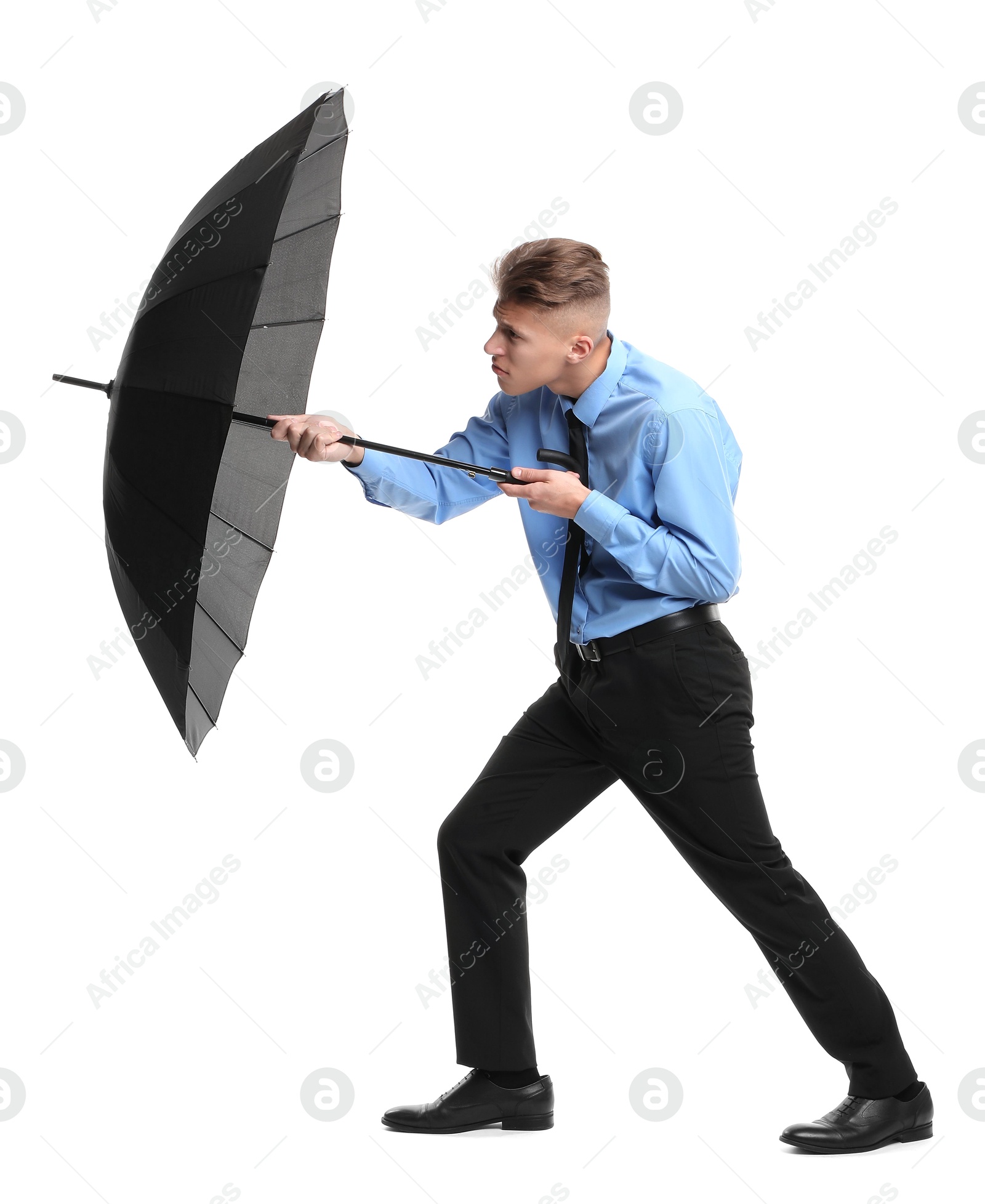 Photo of Man with black umbrella on white background