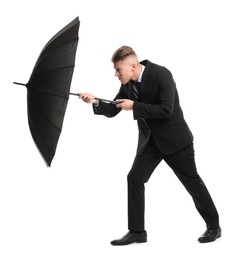 Photo of Man in suit with black umbrella on white background