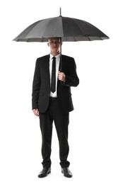 Man in suit with black umbrella on white background