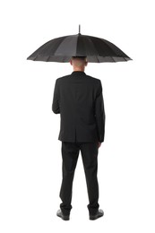 Photo of Man in suit with black umbrella on white background, back view