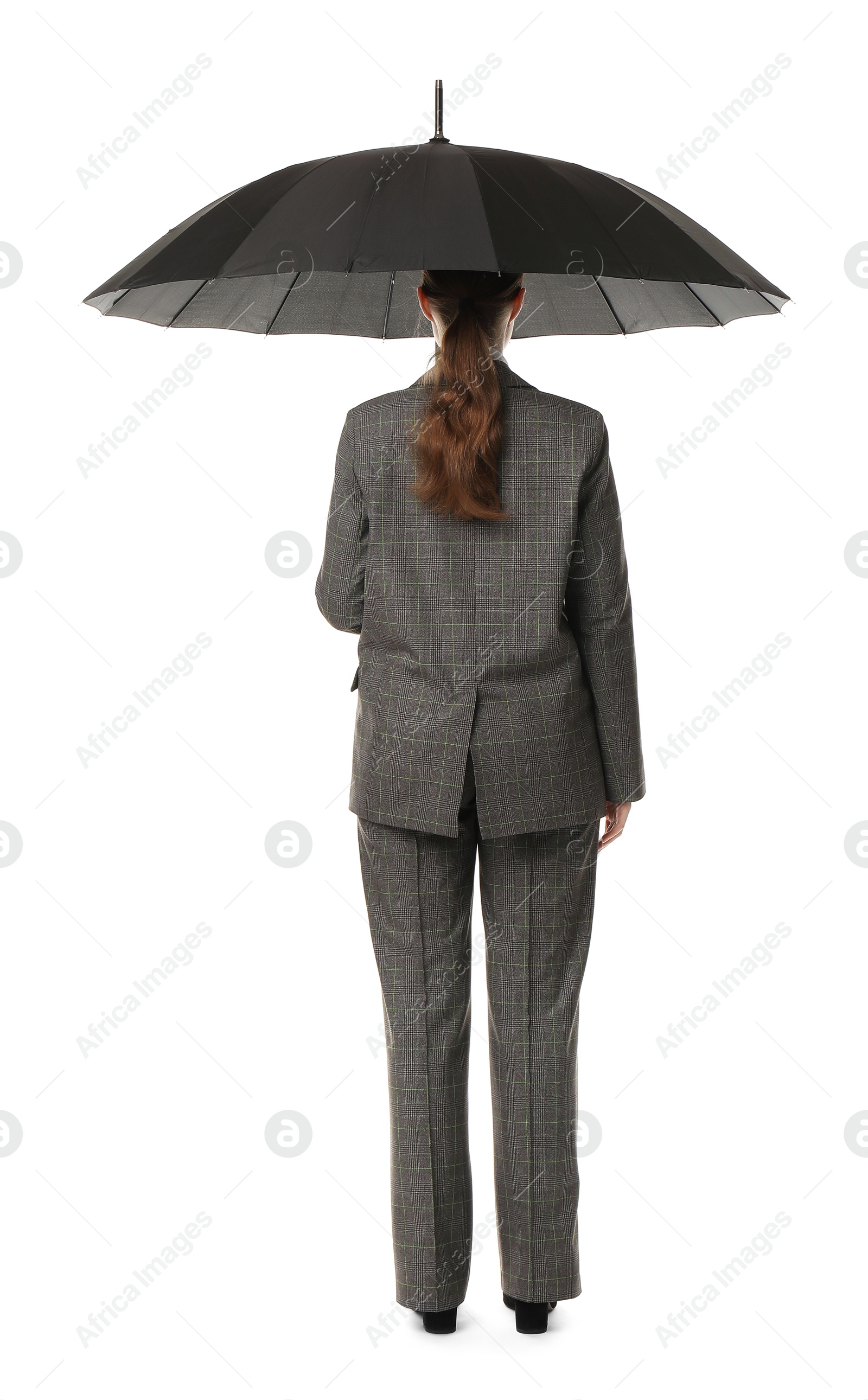 Photo of Young woman with black umbrella on white background, back view