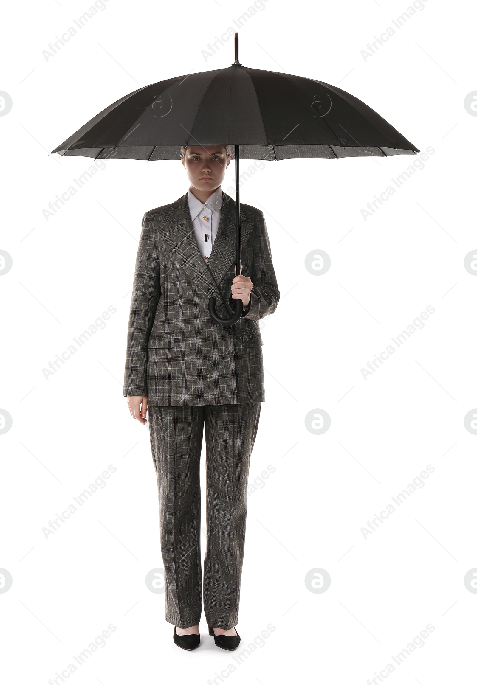 Photo of Young woman with black umbrella on white background