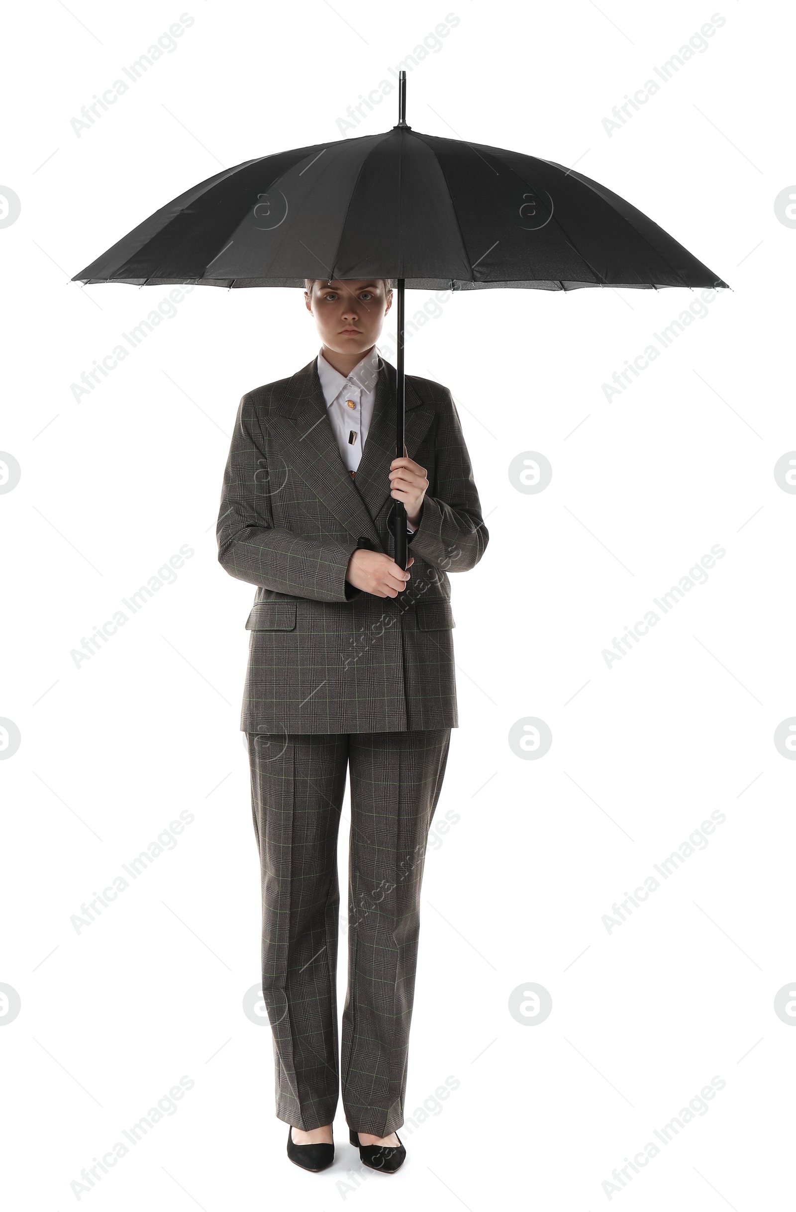 Photo of Young woman with black umbrella on white background