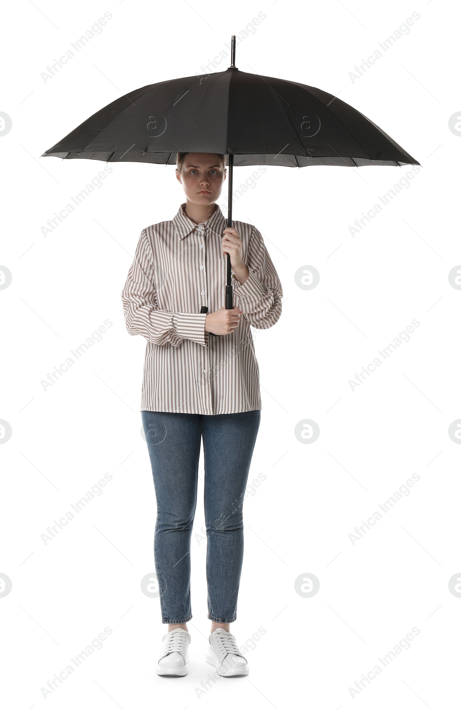 Photo of Young woman with black umbrella on white background