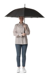 Photo of Young woman with black umbrella on white background