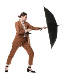 Photo of Young woman with black umbrella on white background