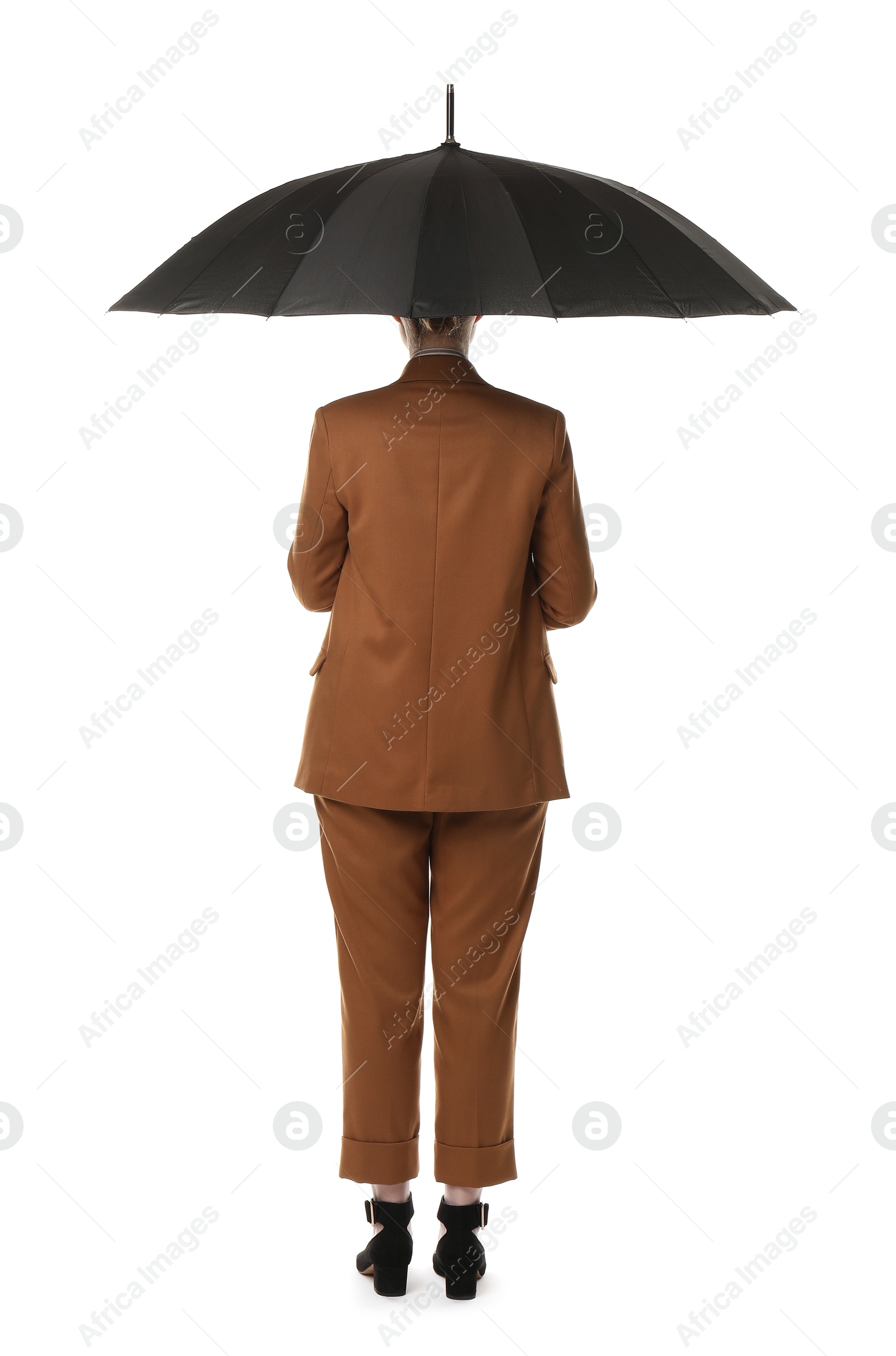 Photo of Young woman with black umbrella on white background, back view