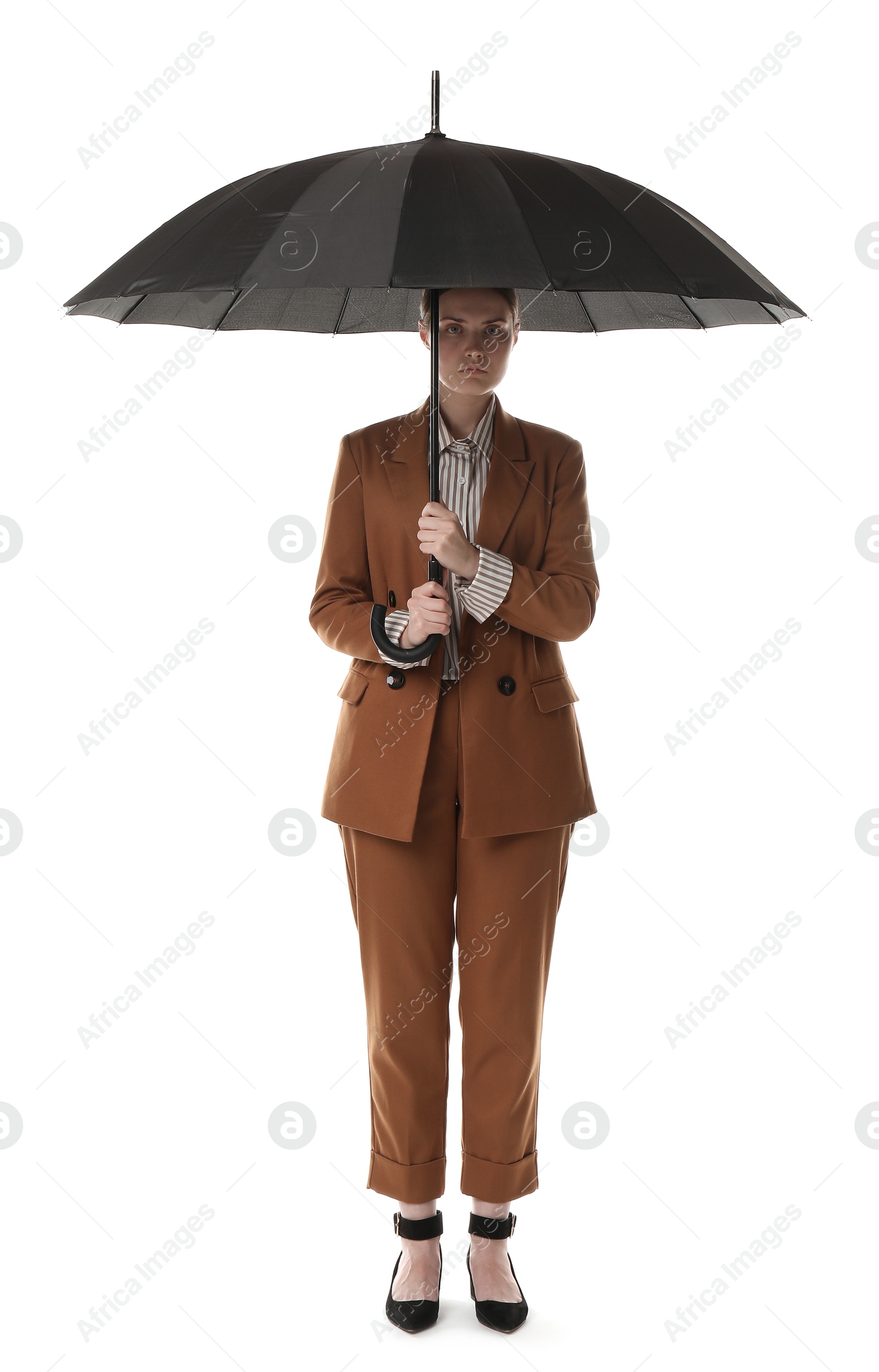 Photo of Young woman with black umbrella on white background