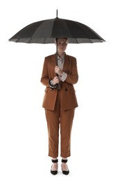 Photo of Young woman with black umbrella on white background