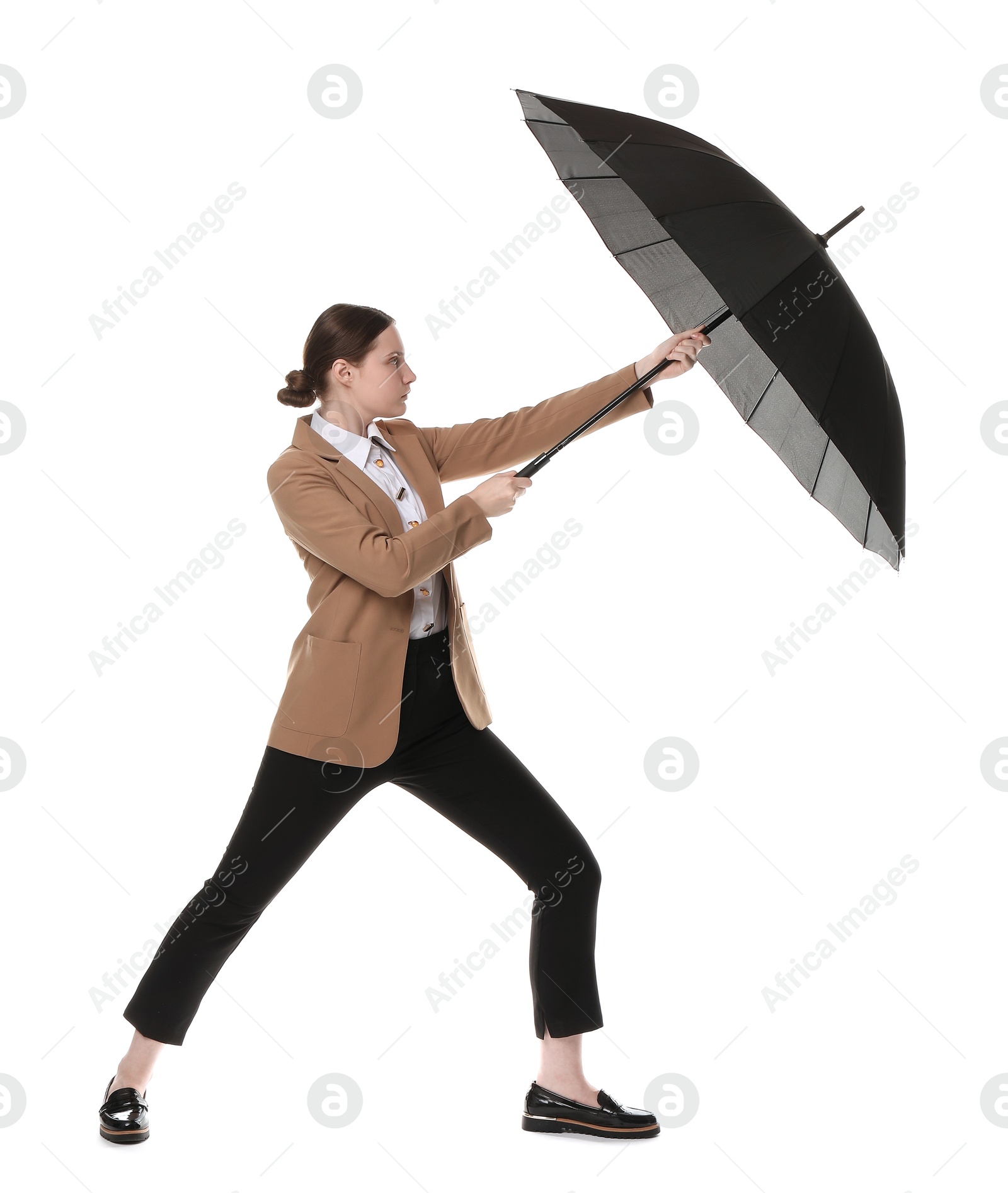 Photo of Young woman with black umbrella on white background