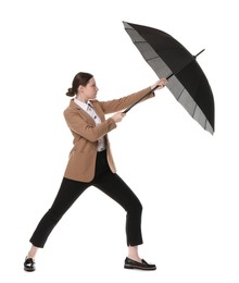 Photo of Young woman with black umbrella on white background