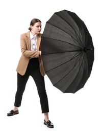 Photo of Young woman with black umbrella on white background