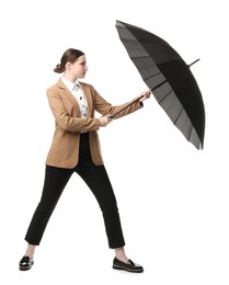 Photo of Young woman with black umbrella on white background