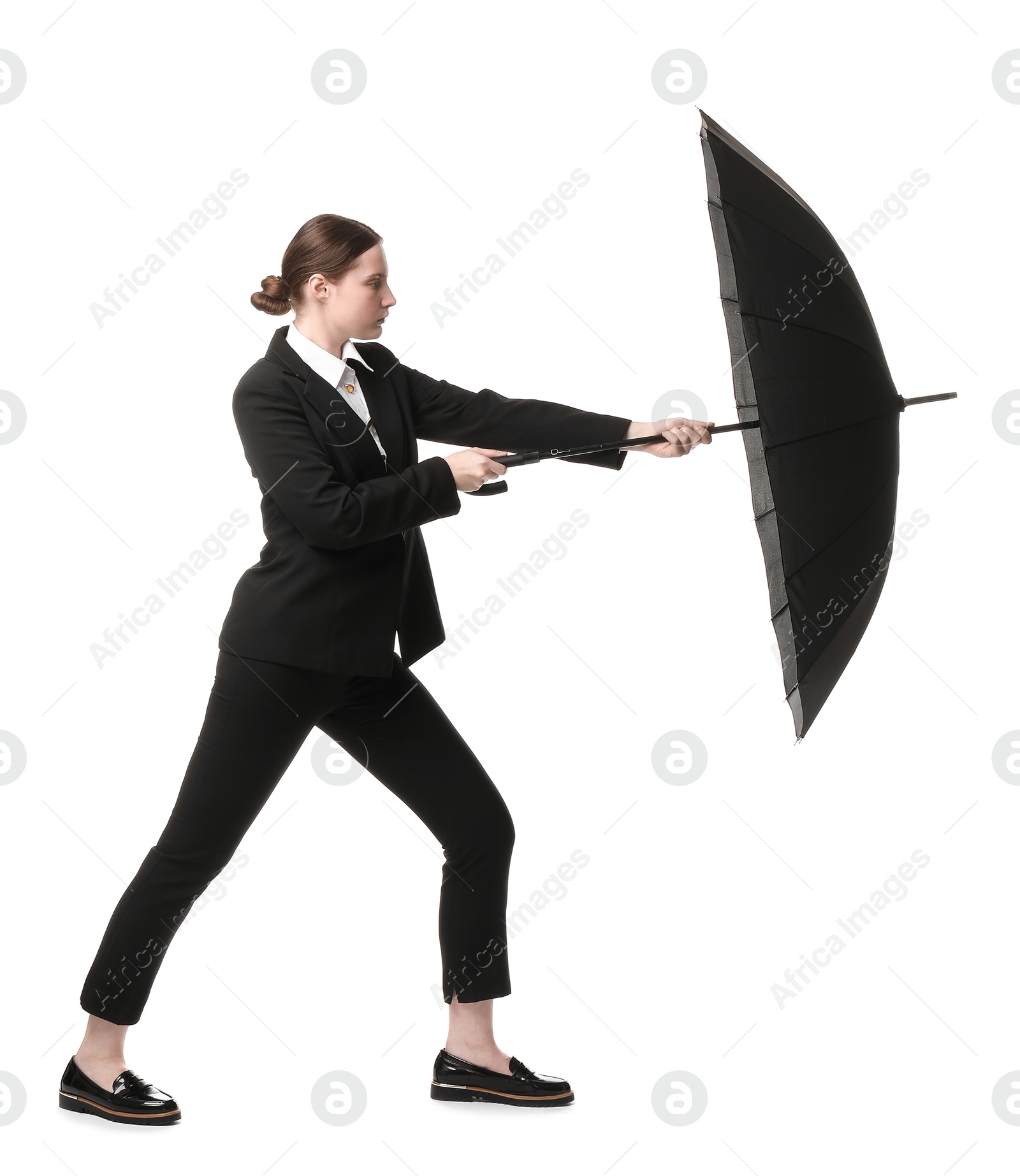 Photo of Young woman with black umbrella on white background