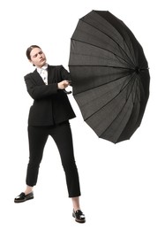 Photo of Young woman with black umbrella on white background