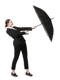 Photo of Young woman with black umbrella on white background