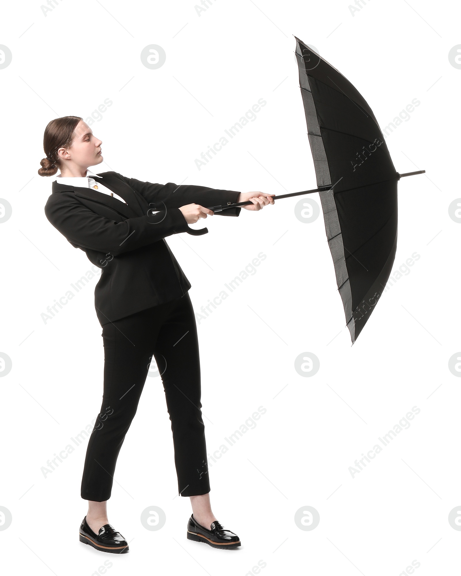 Photo of Young woman with black umbrella on white background