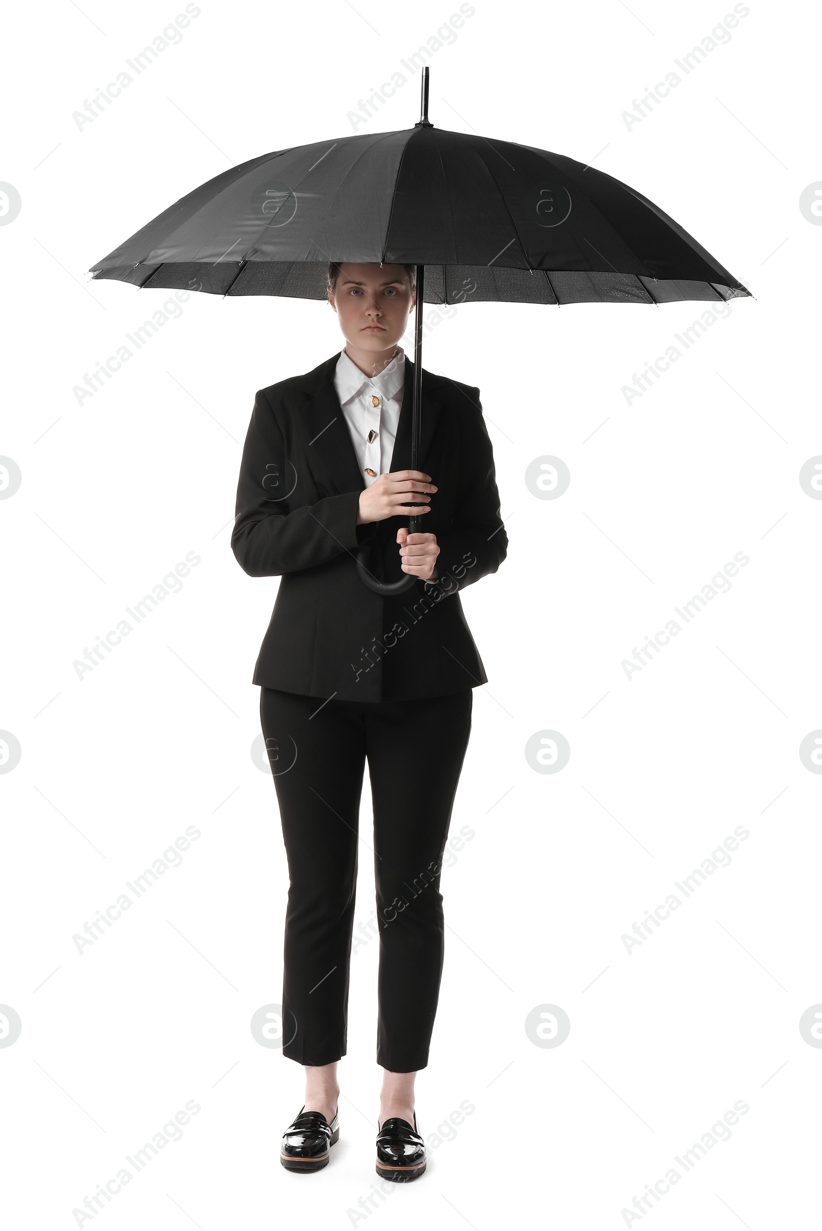 Photo of Young woman with black umbrella on white background