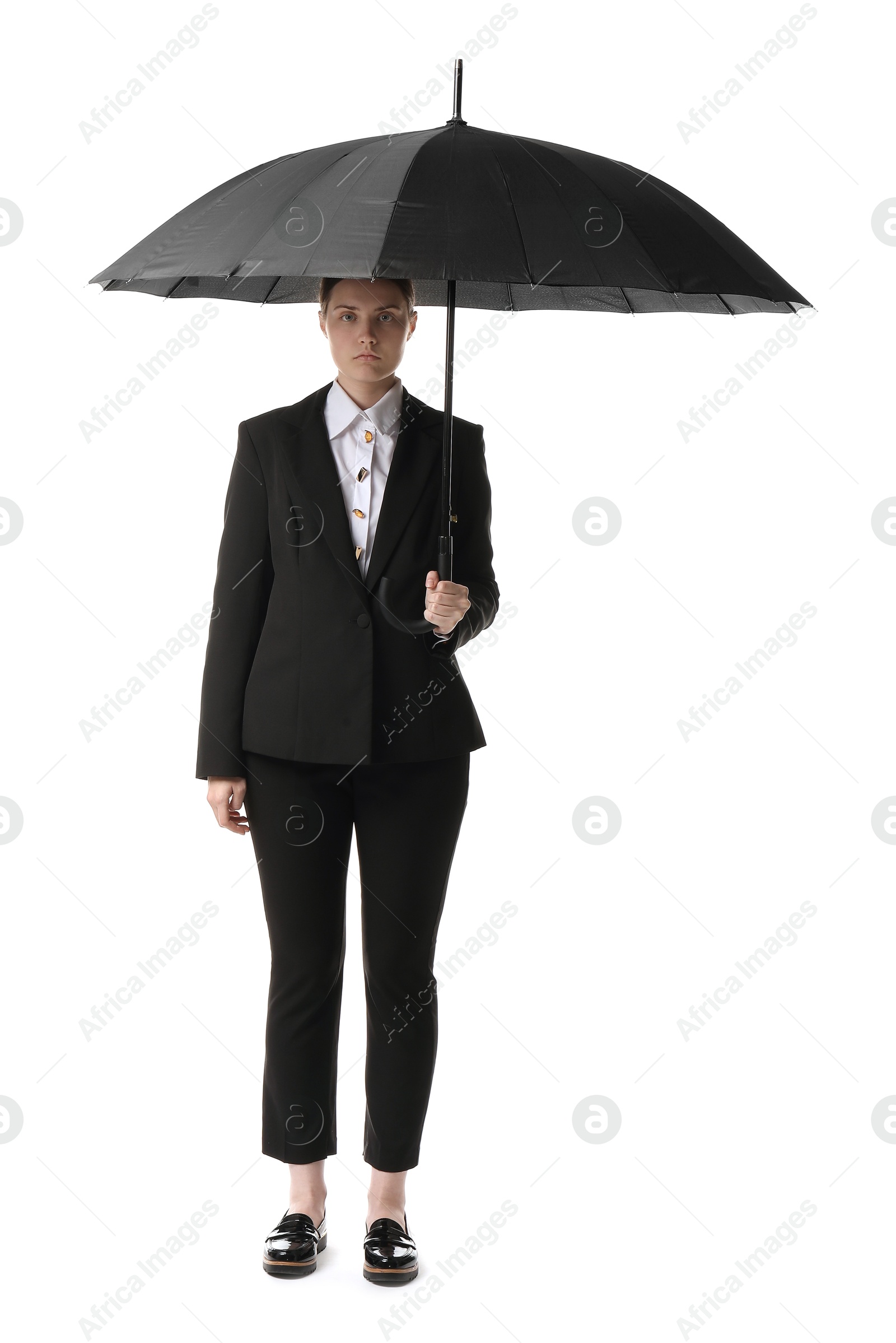 Photo of Young woman with black umbrella on white background