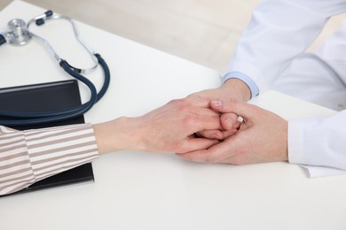 Photo of Dependent woman having appointment with addiction specialist in clinic, closeup