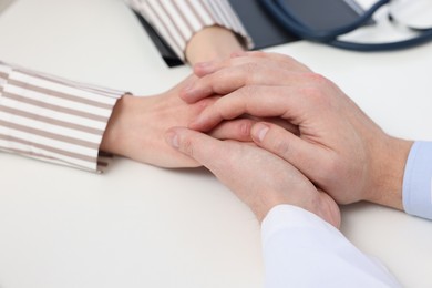 Photo of Dependent woman having appointment with addiction specialist in clinic, closeup