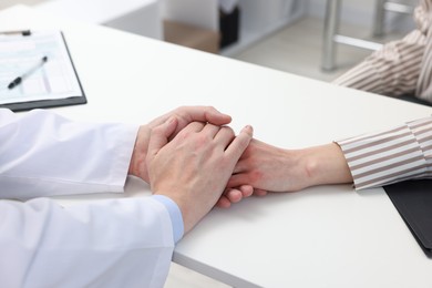 Photo of Dependent woman having appointment with addiction specialist in clinic, closeup