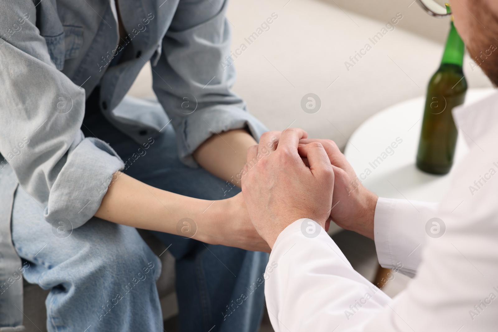 Photo of Dependent woman having appointment with addiction specialist in clinic, closeup