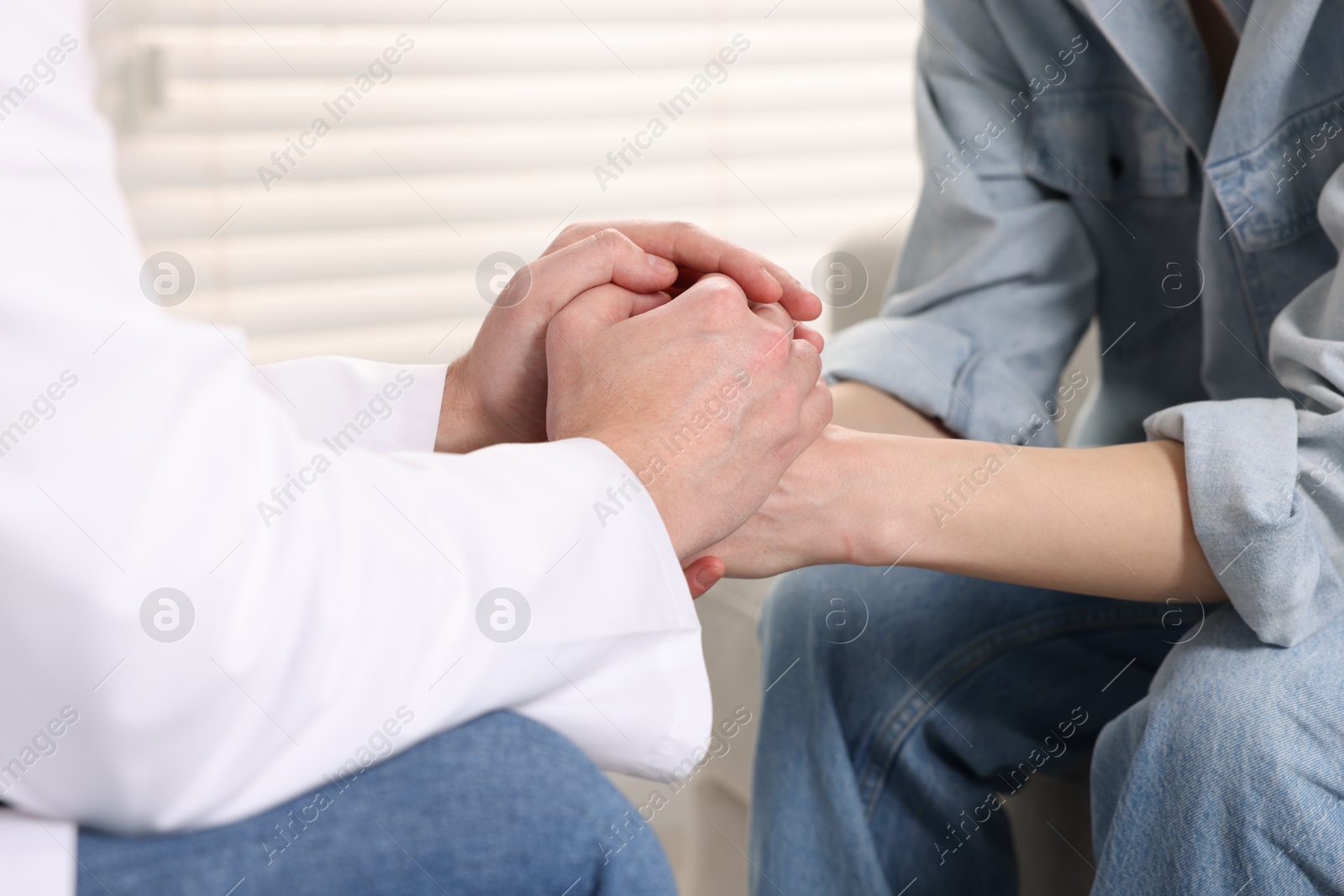 Photo of Dependent woman having appointment with addiction specialist in clinic, closeup