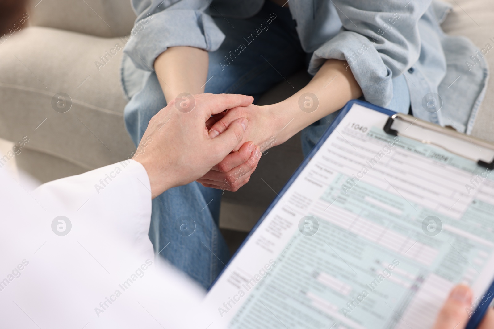 Photo of Dependent woman having appointment with addiction specialist in clinic, closeup