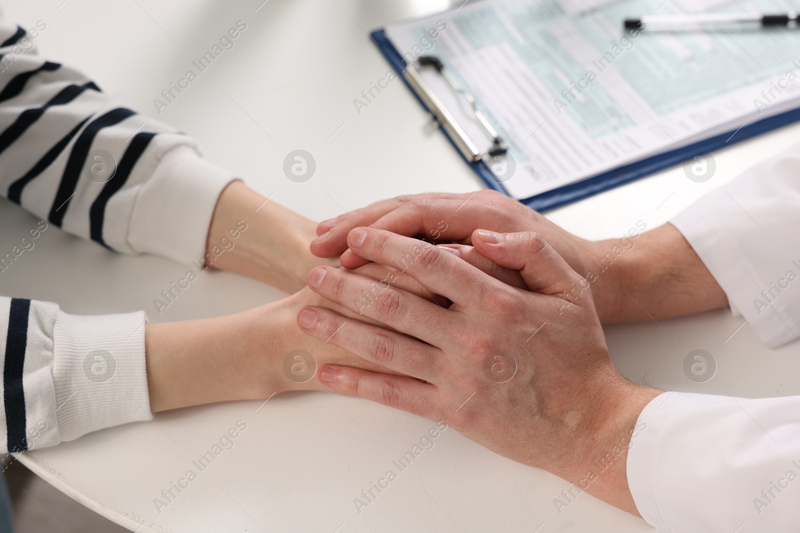 Photo of Dependent woman having appointment with addiction specialist in clinic, closeup