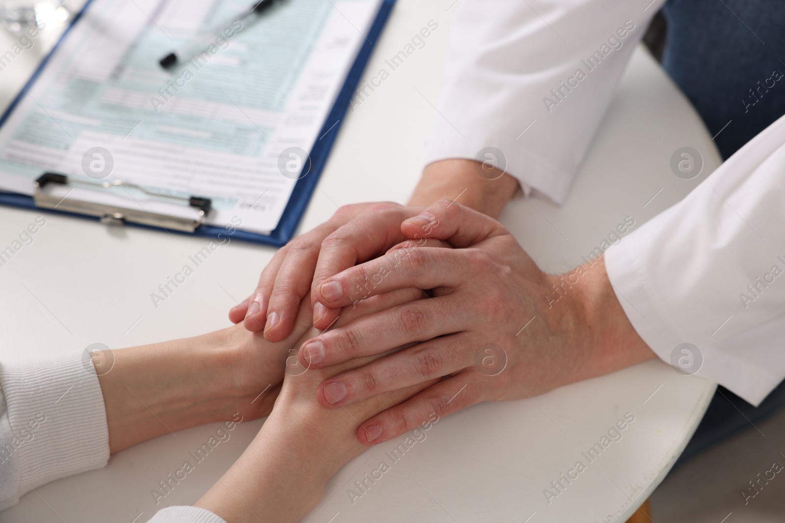 Photo of Dependent woman having appointment with addiction specialist in clinic, closeup