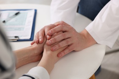 Photo of Dependent woman having appointment with addiction specialist in clinic, closeup