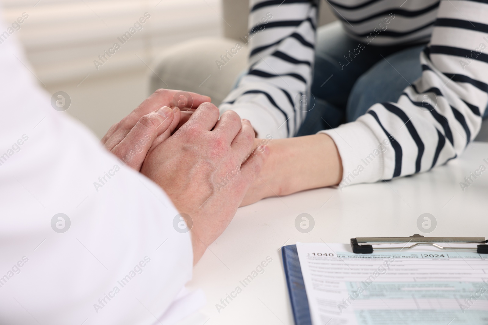 Photo of Dependent woman having appointment with addiction specialist in clinic, closeup