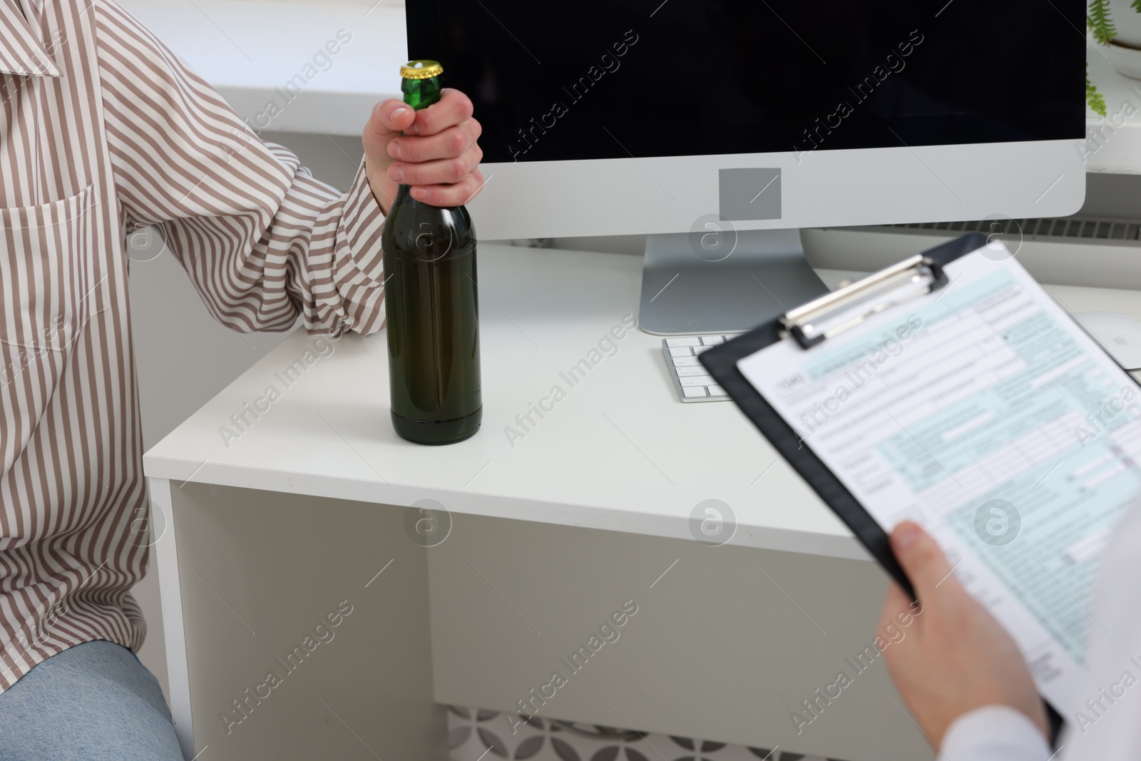 Photo of Alcoholic woman having appointment with healthcare specialist in clinic, closeup. Addiction treatment