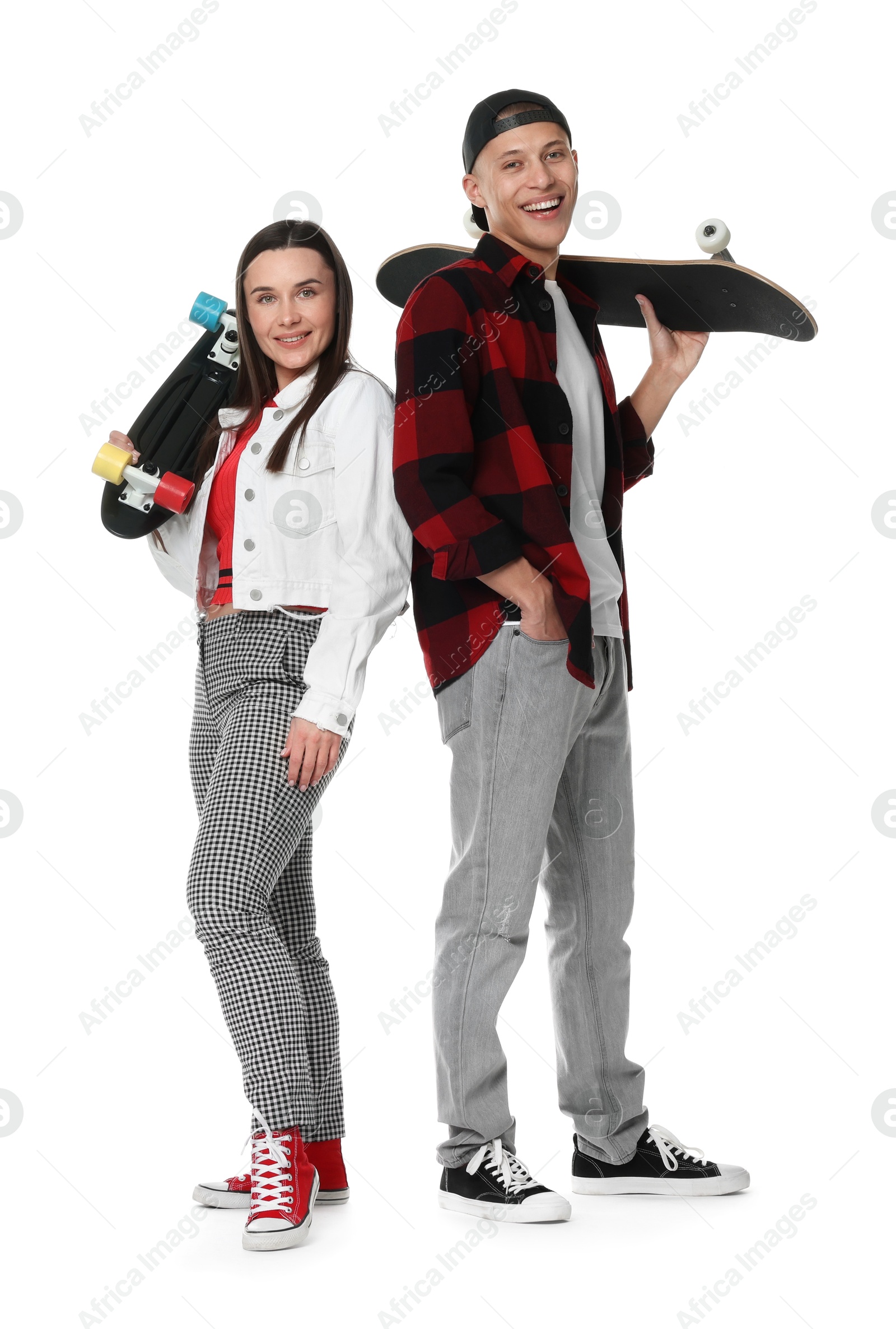 Photo of Happy friends with skateboards on white background