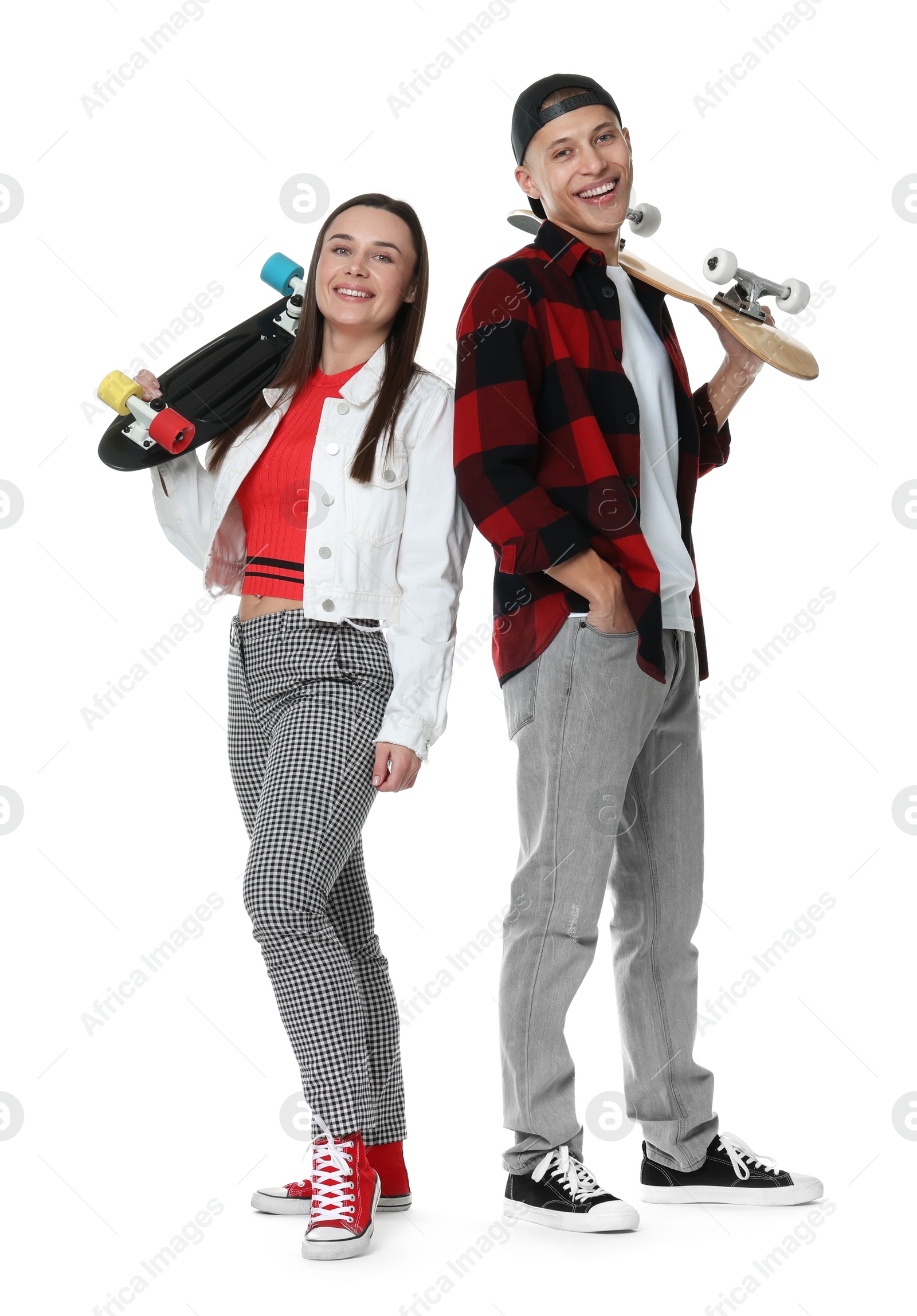 Photo of Happy friends with skateboards on white background