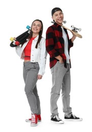 Photo of Happy friends with skateboards on white background