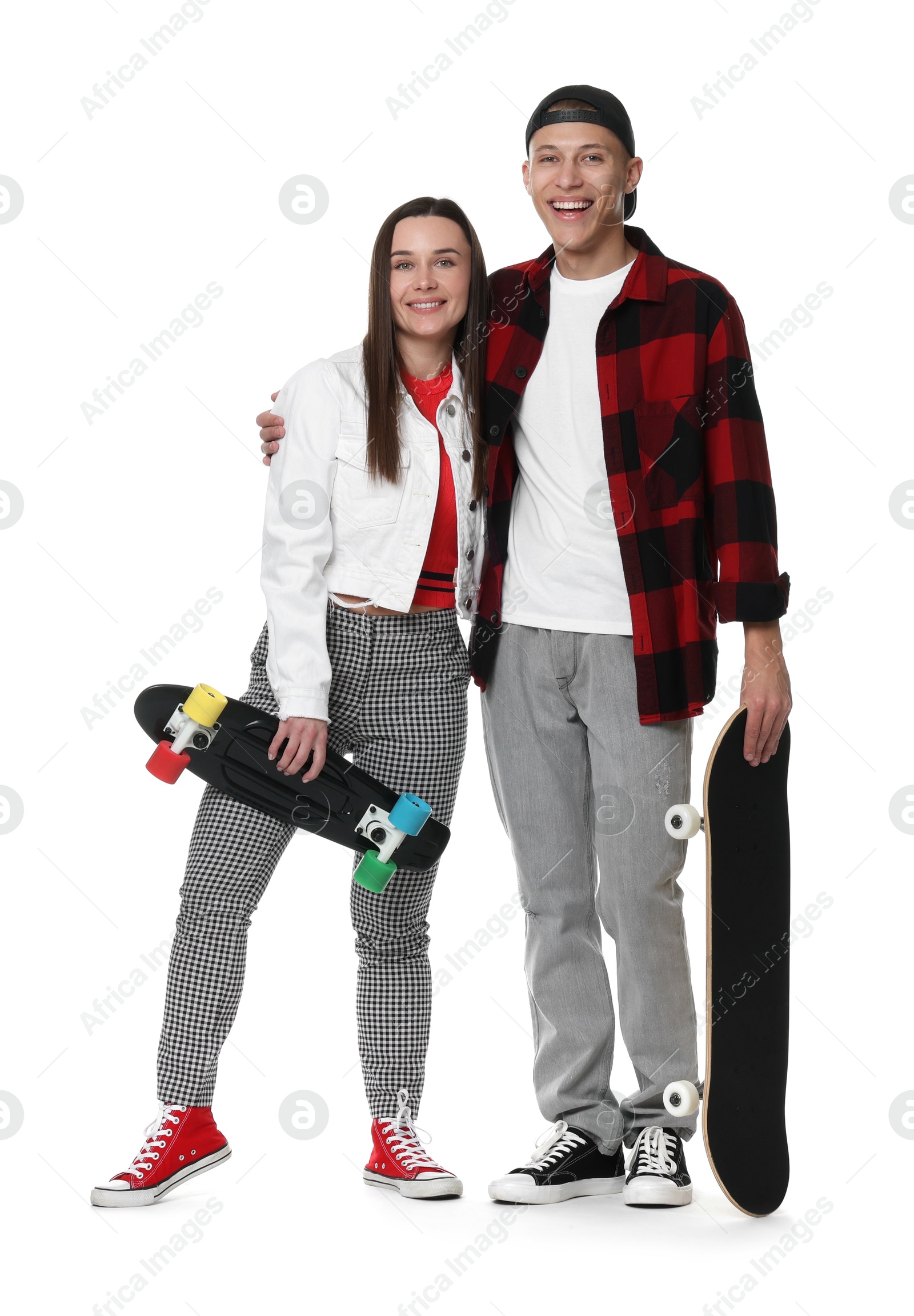 Photo of Happy friends with skateboards on white background