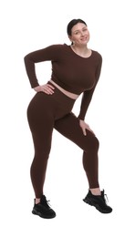 Photo of Plus size woman in gym clothes on white background