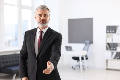 Photo of Portrait of banker in office, space for text