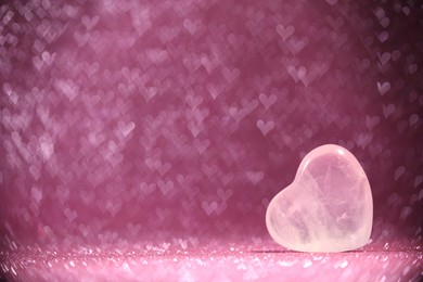 Photo of Romantic decor. Wooden heart on shiny pink glitter and bokeh lights, space for text