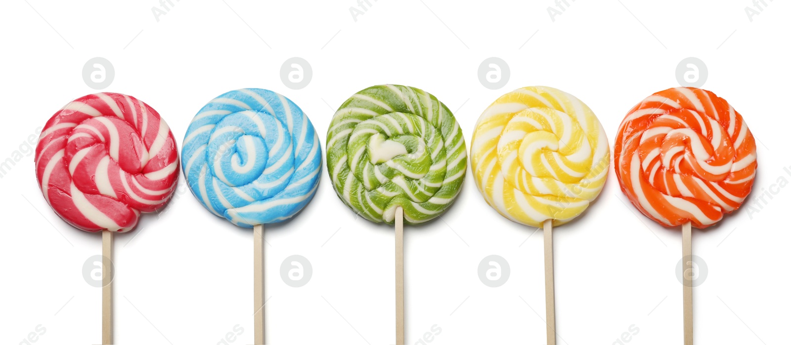 Photo of Tasty lollipops isolated on white, top view